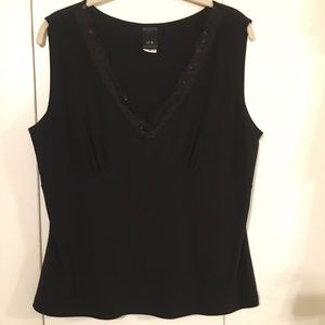 Sleeveless v neck top with lace trim and beads